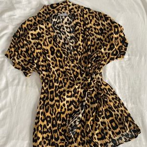 Like new cheetah print skort romper from Urban Outfitters, M